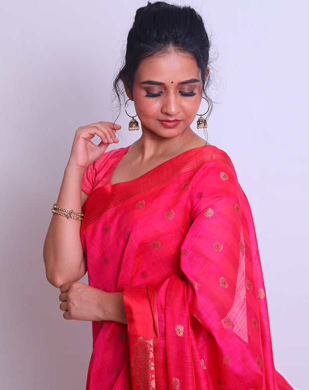 A Rani Pink Cotton saree with self lines woven all over the drape and zari buttis sounds elegant - FCT011145