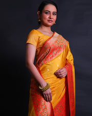 The mustard Banarasi silk saree you're describing sounds absolutely stunning.- BSK010581