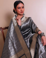 The black Banarsi silk handloom saree you described sounds absolutely luxurious - BSK010500